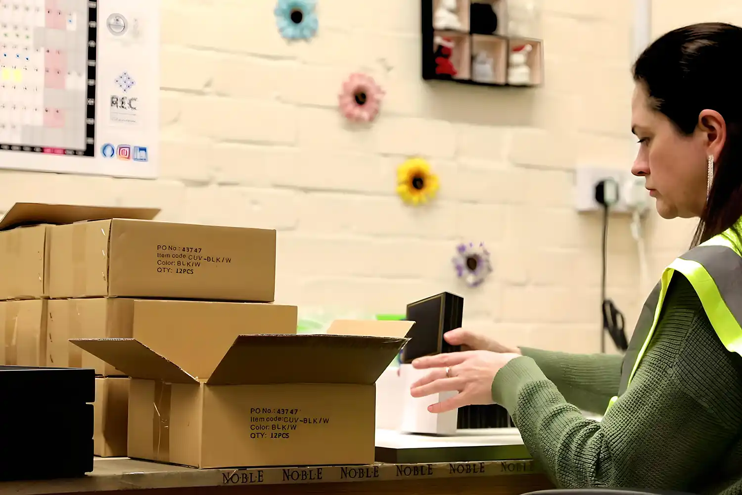 Noble Luxury packaging - our team at the workstation